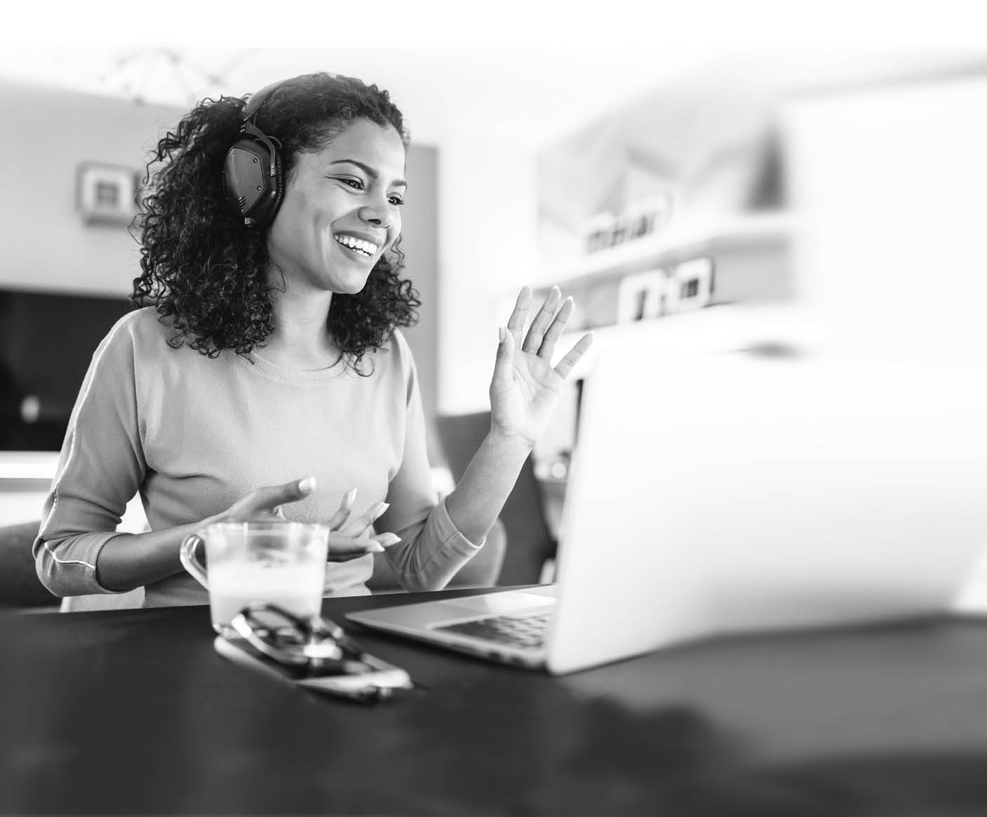 Young modern woman having Video Conference at home
